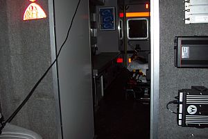 Inside view of patient treatment area from Medic Unit driver's compartment.